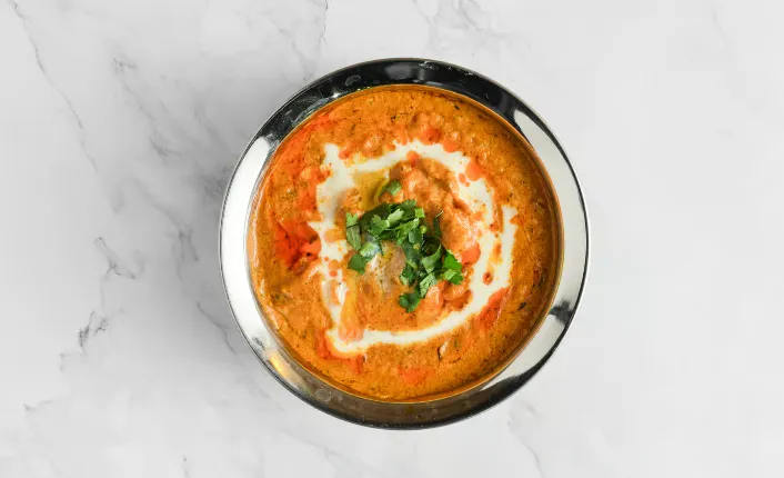 Butter Chicken - Rich creamy tomato curry at Amantran Indian restaurant in Winnipeg