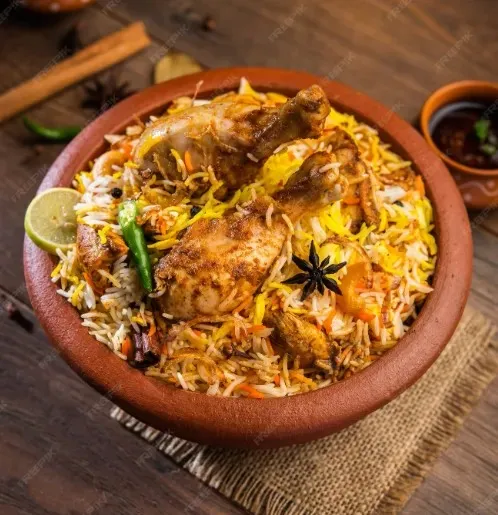 Chicken Biryani — fragrant basmati rice with spiced chicken at Amantran Winnipeg
