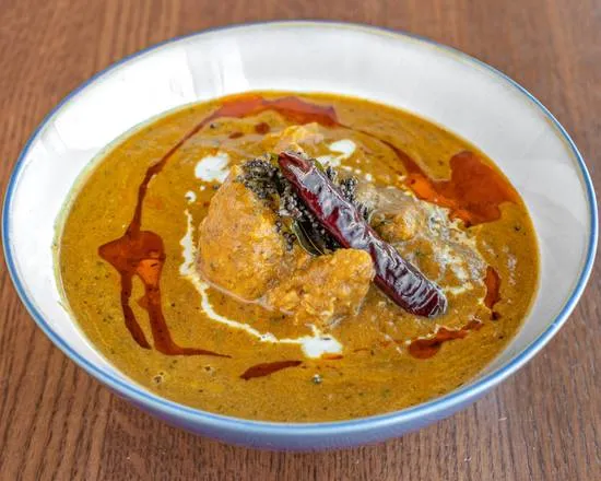 Butter Chicken — rich creamy tomato curry at Amantran Indian restaurant Winnipeg